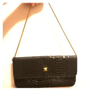 Urban heritage Snakeskin embossed handbag